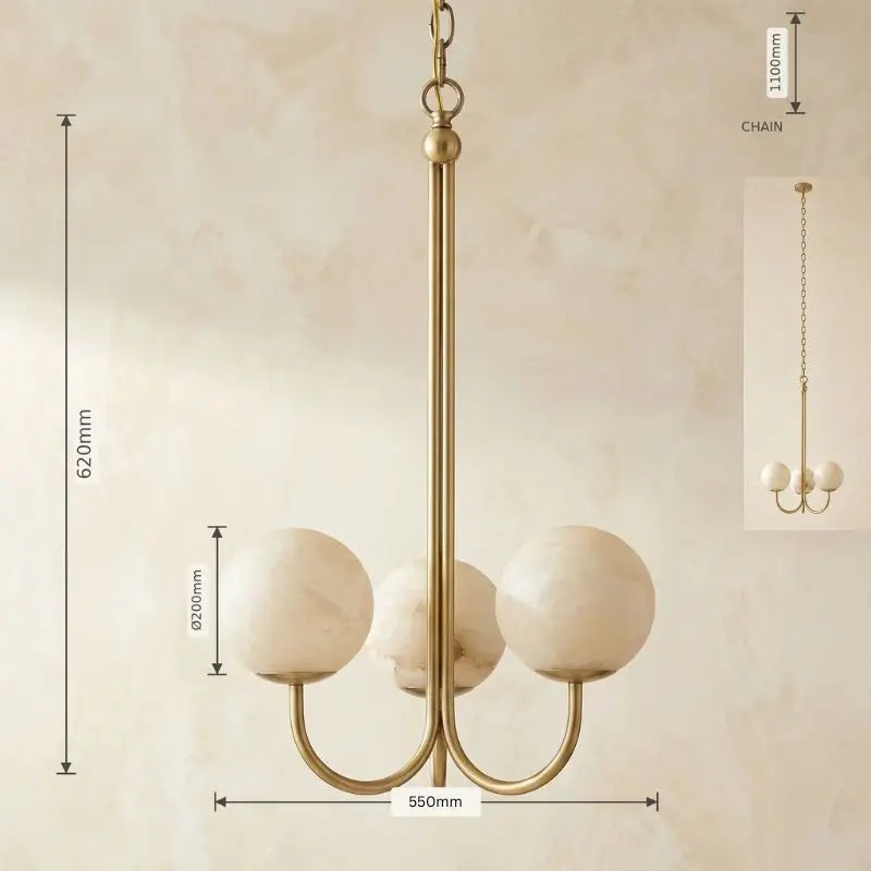 A three-light brass pendant chandelier with oval white glass shades, shown with dimension callouts for height, width, and chain length on a warm beige background.