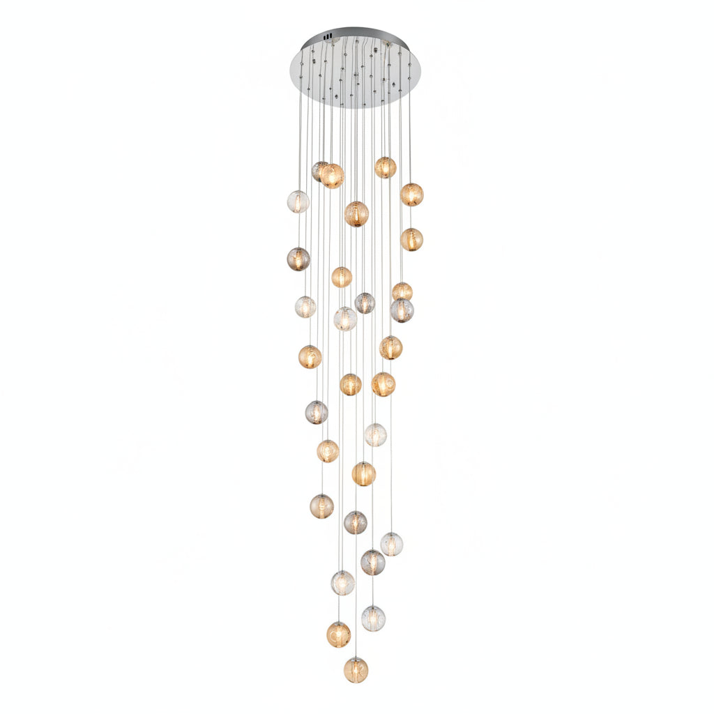 Modern chandelier hanging from a ceiling in a stylish interior setting.