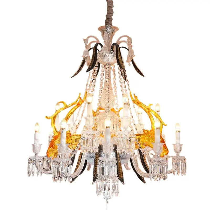Decorative chandelier with crystal elements and yellow accents on a white background