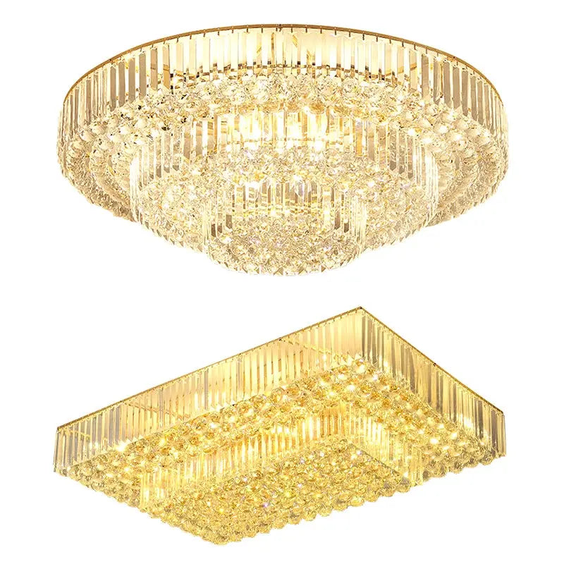 Two gold chandelier lights on a white background