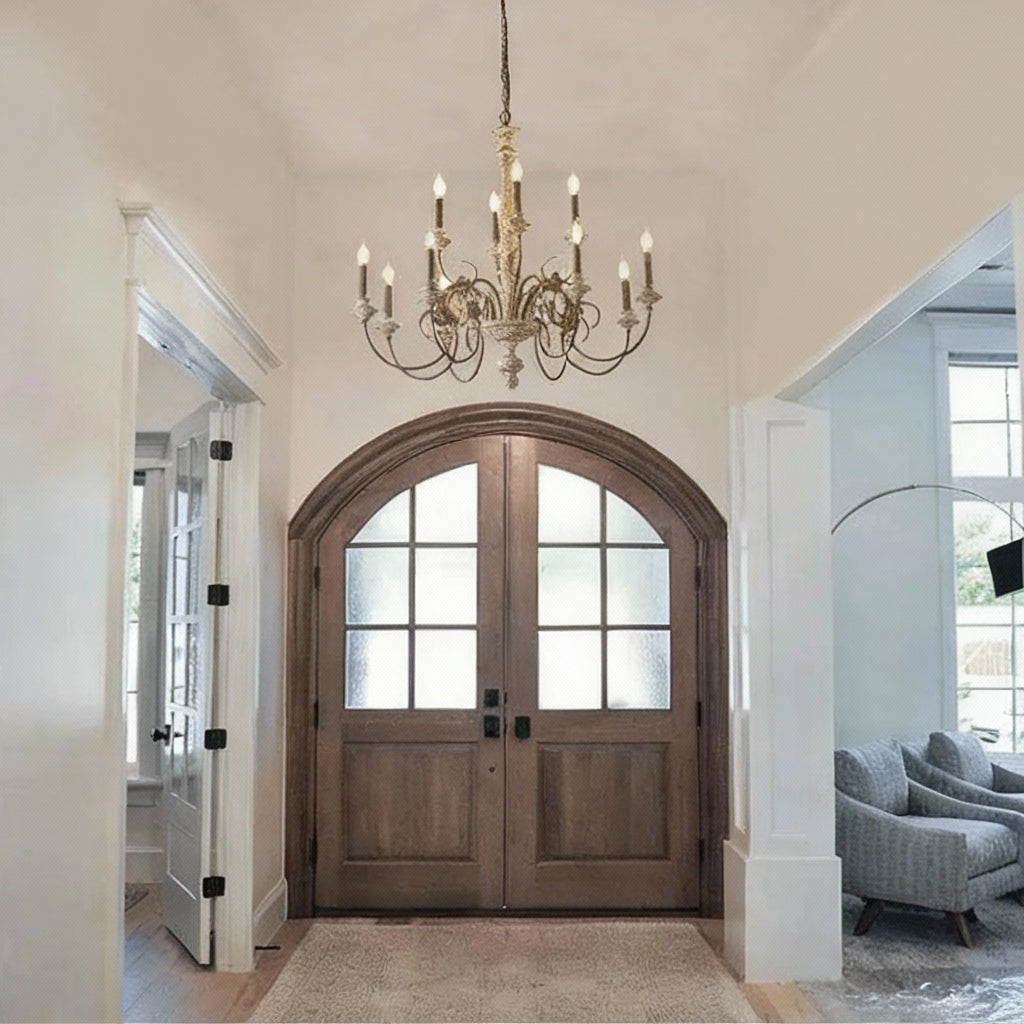 Chandelier hanging above a wooden door in a well-lit room with 'Hua Yao Lighting' branding.