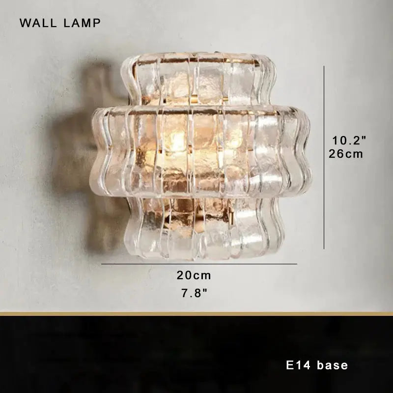 Wall lamp with clear glass shade and dimensions on a light gray background
