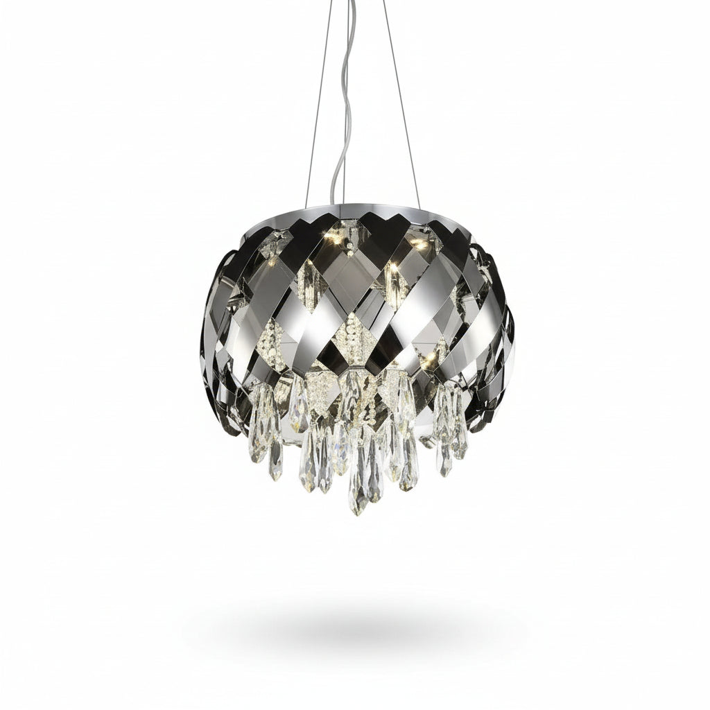 Dining room with a modern chandelier, round table, and chairs.