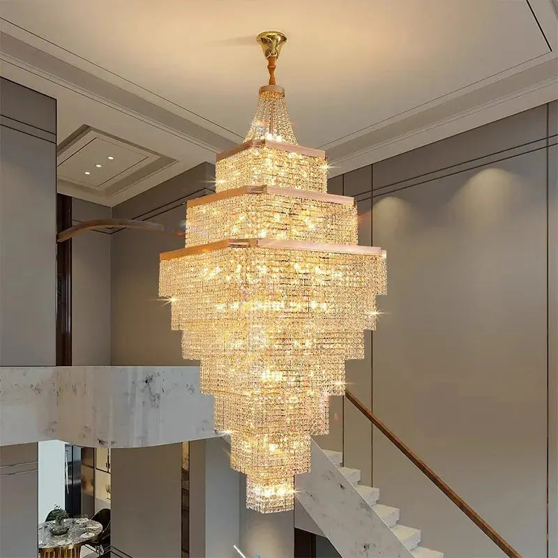 Luxurious chandelier hanging in a room with a staircase