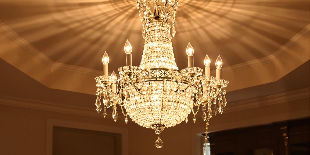 Elegant chandelier with crystals in a stylish dining room.