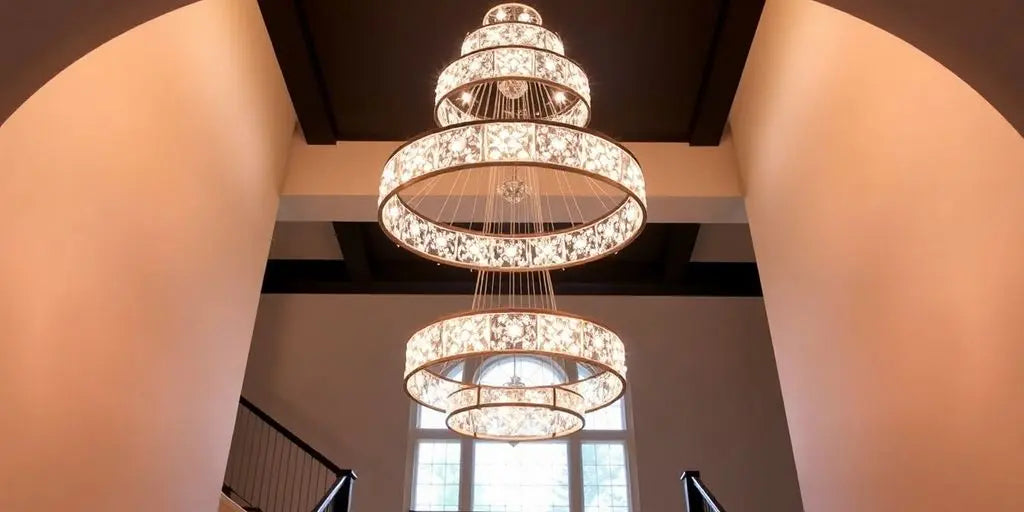 Modern LED chandelier above a stylish staircase.