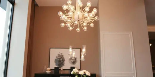 Contemporary chandelier above a stylish dining table.