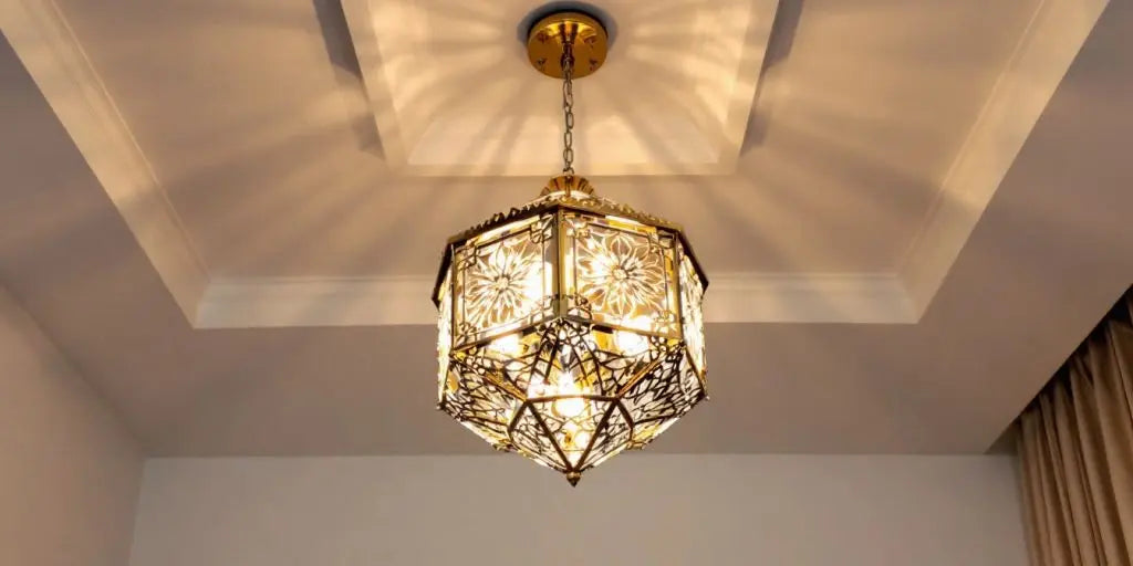 Geometric chandelier with metallic and glass elements.
