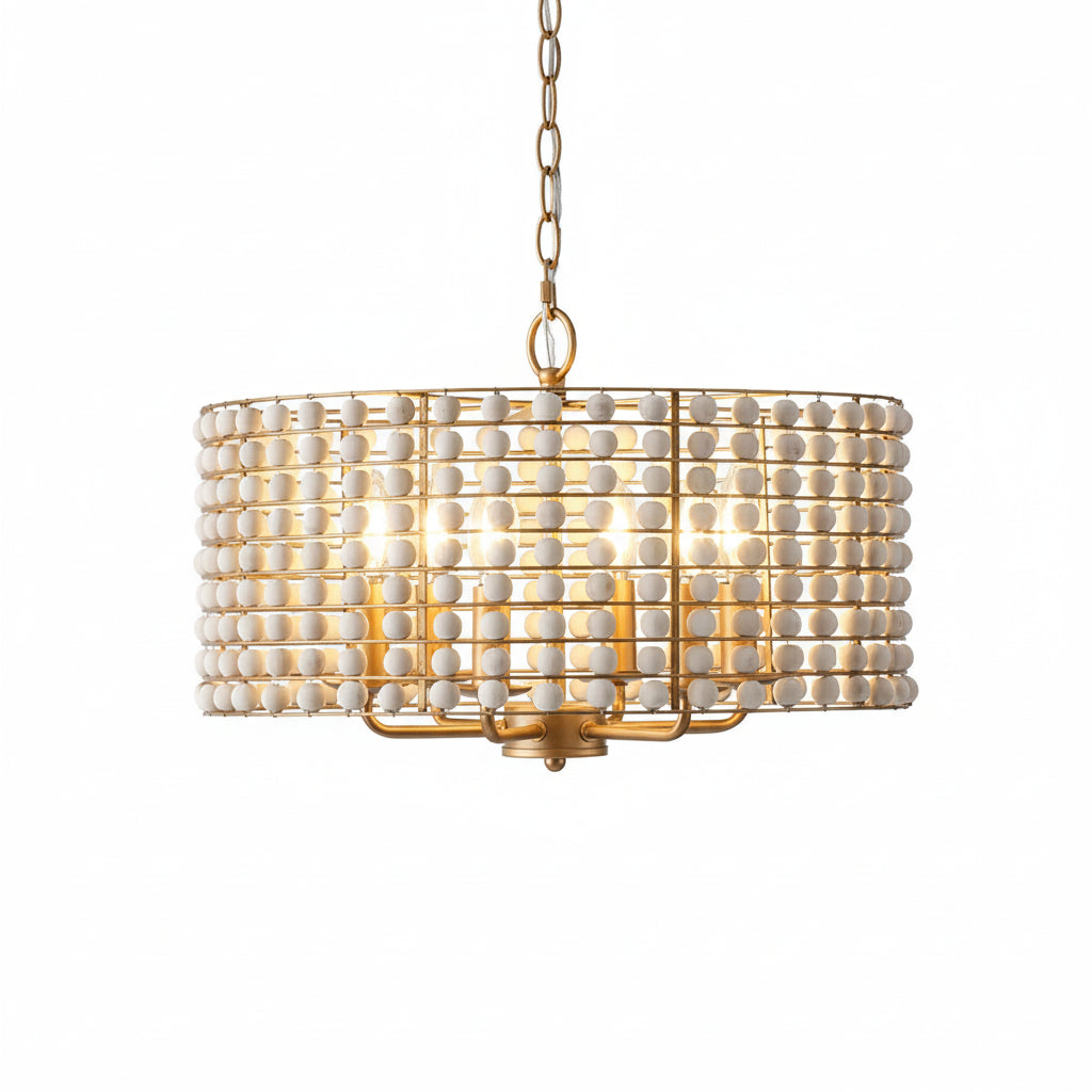 Chandelier with white spherical design and gold frame in a room setting